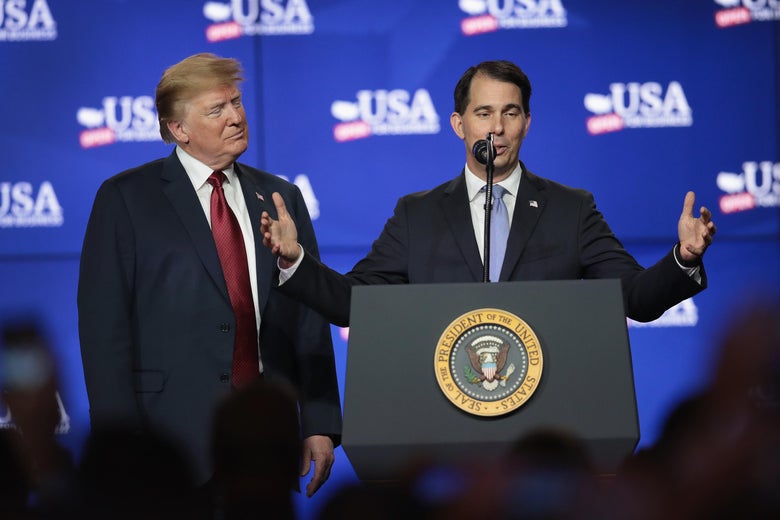 President Donald Trump and Gov. Scott Walker onstage together.